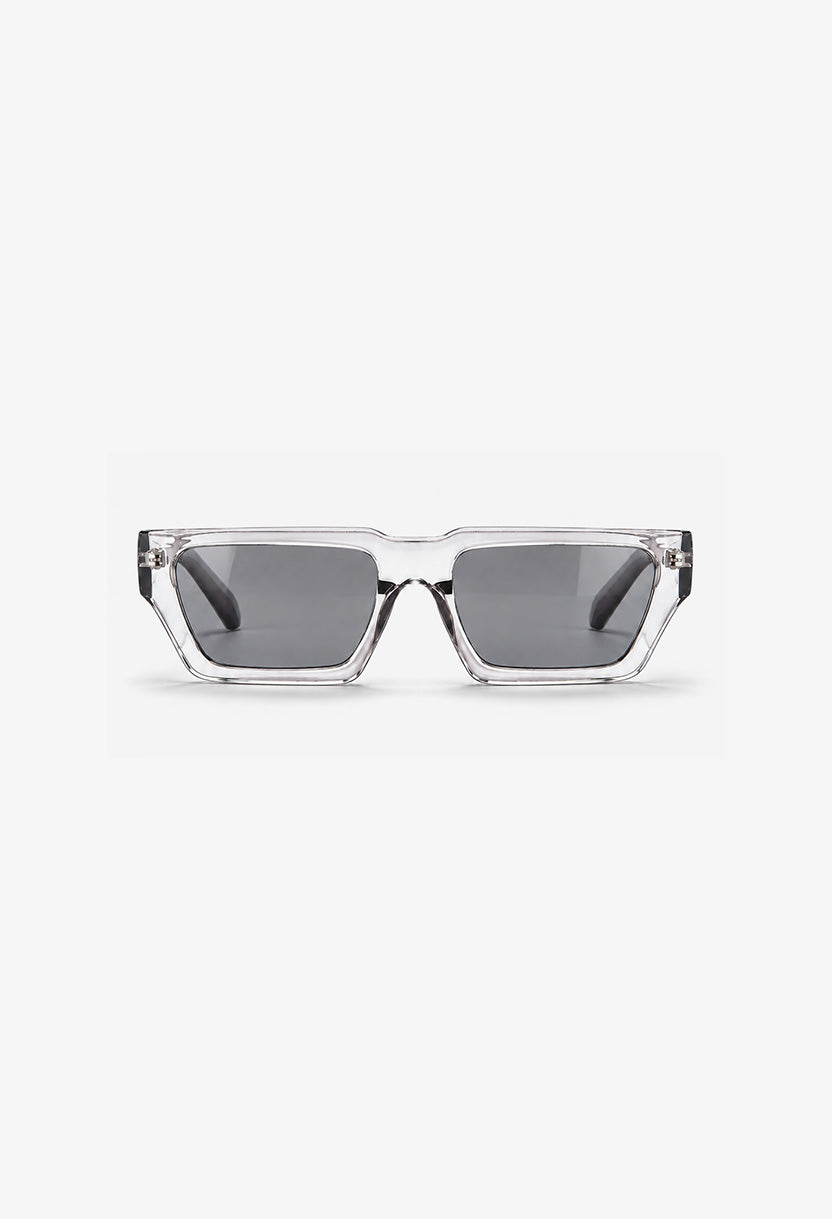 NEW STATEMENT NEXUS sunglasses in transparent, angled view of the clear frame with smoke lenses #color_transparant