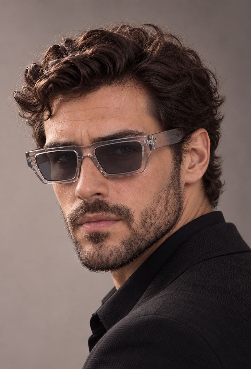 Man wearing NEW STATEMENT NEXUS sunglasses in transparent, side angle showing the clear temple arm #color_transparant