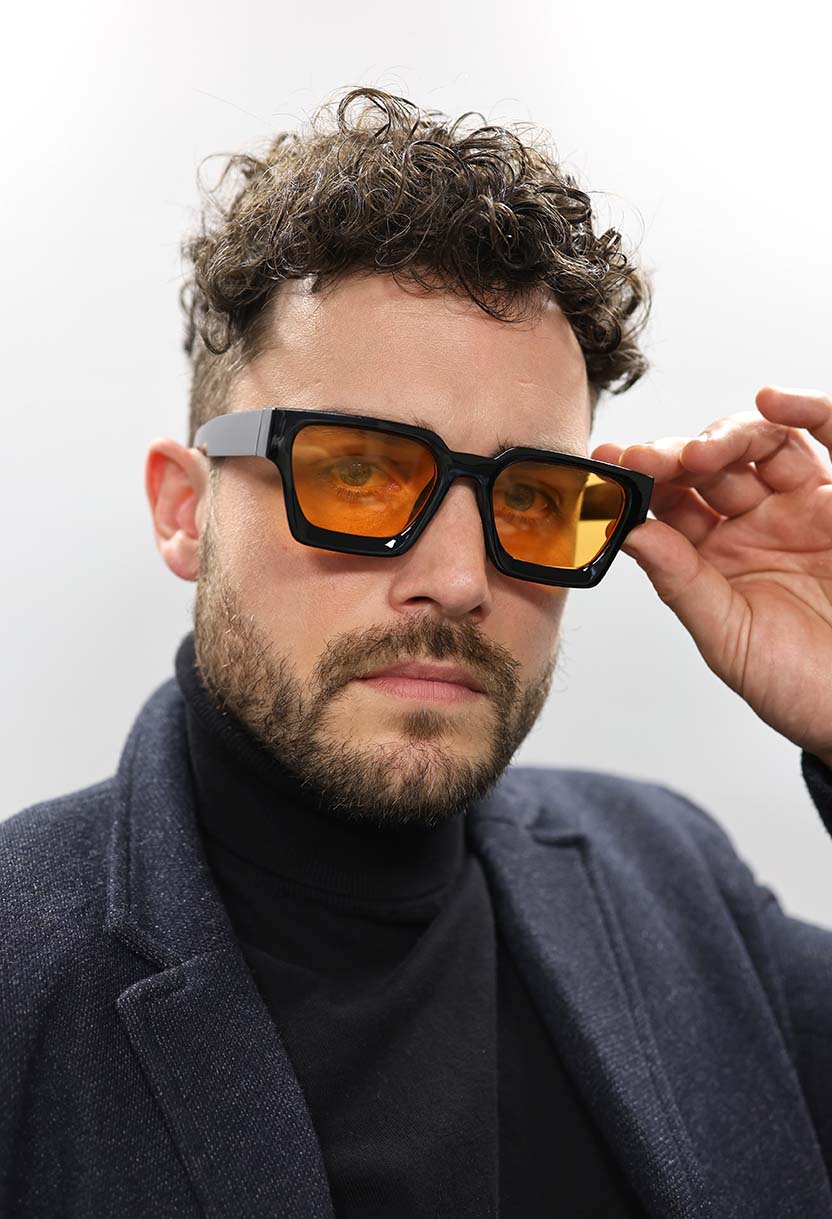 PRIME V2 sunglasses in Black/Orange, close view of the rectangular frame #color_black-orange